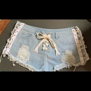 Lace up denim shorts size M